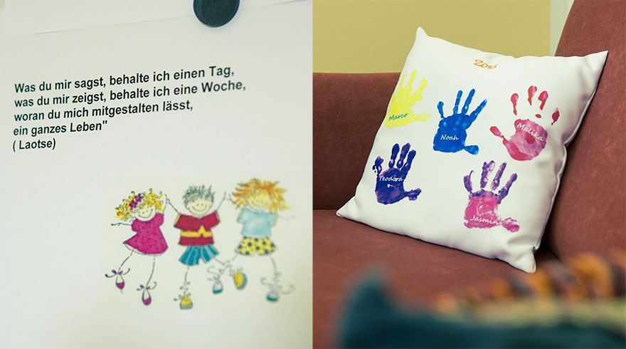 A sheet of paper with a quote from Lao-tzu. A cushion adorned with colourful children’s hand prints.